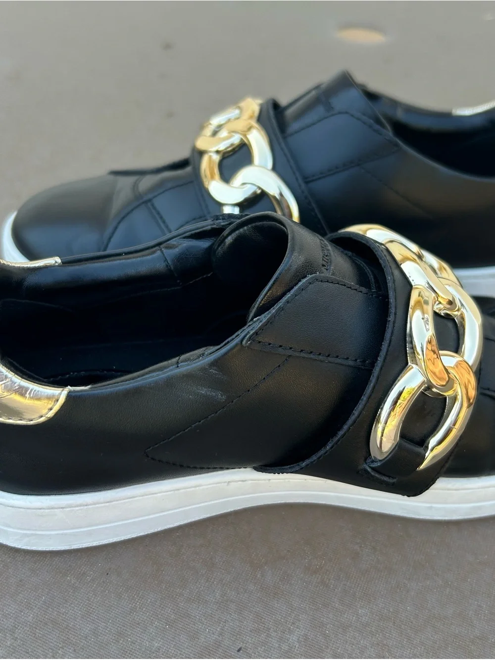 Michael Kors Kenna Black Leather Slip-On Sneakers with Gold Chain Accent Sz 8.5